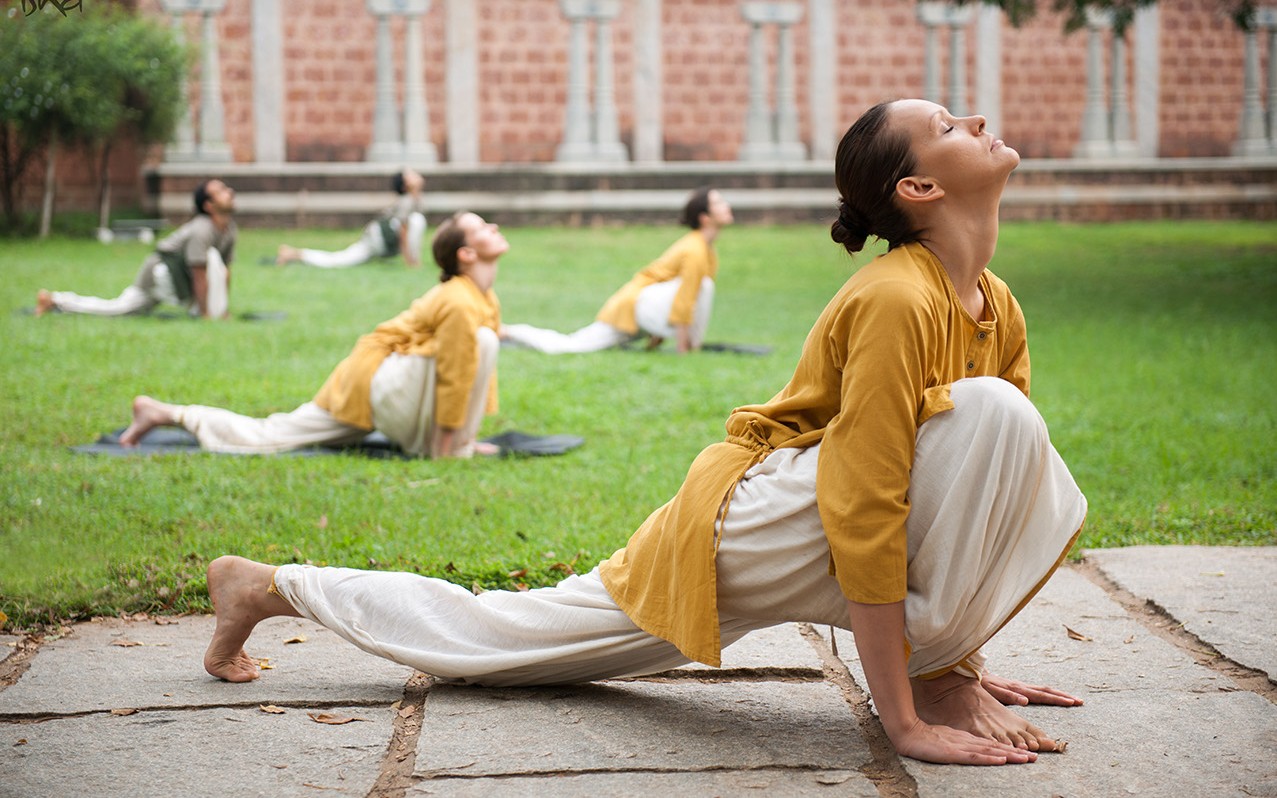 Person practicing Surya Kriya.